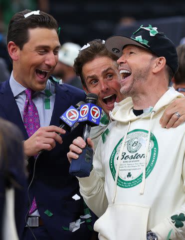 <p>Mike Lawrie/Getty</p> Joey McIntyre and Donnie Wahlberg