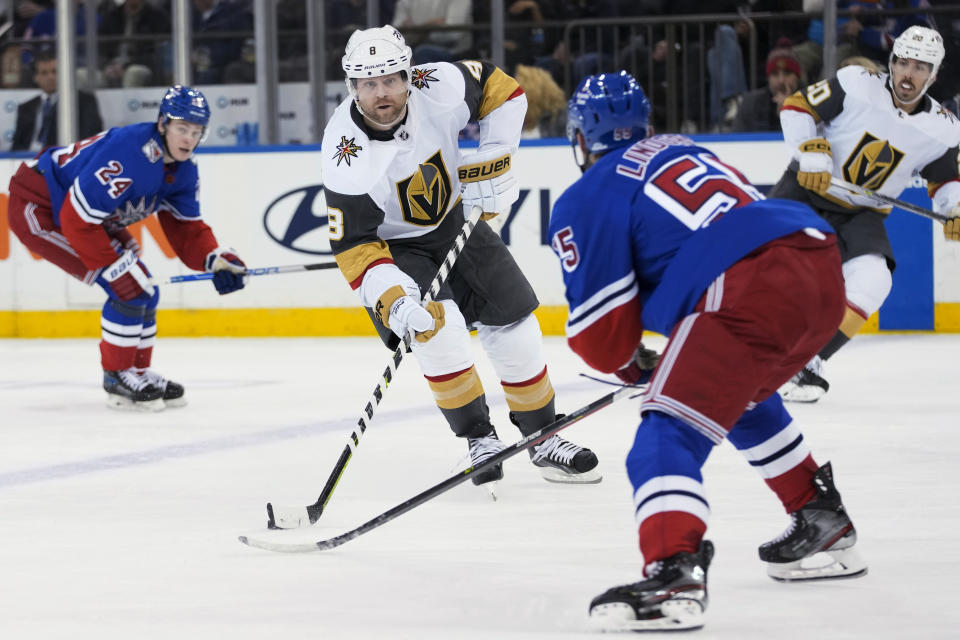 Vegas Golden Knights right wing Phil Kessel (8) skates against New York Rangers defenseman Ryan Lindgren (55) during the second period of an NHL hockey game Friday, Jan. 27, 2023, at Madison Square Garden in New York. (AP Photo/Mary Altaffer)