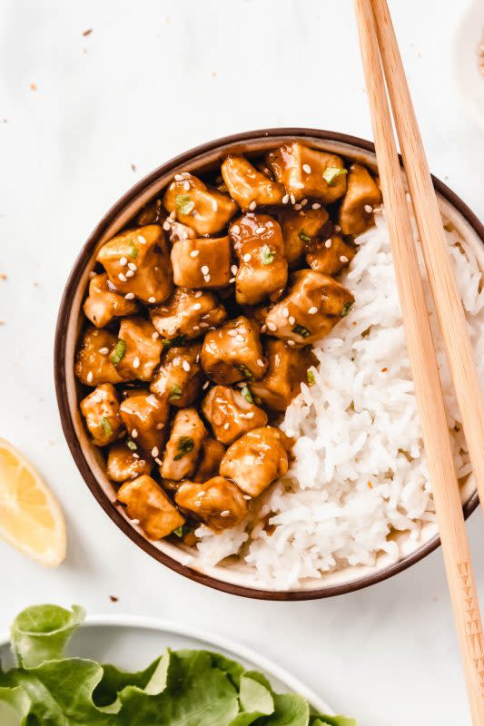 <p>Damn Spicy</p><p>Crispy pan-fried tofu smothered in sticky homemade teriyaki sauce served over fluffy rice! This quick and easy tofu dinner or lunch comes together in less than an hour, is naturally vegan & gluten-free!</p><p><strong>Get the recipe: <a href="https://damnspicy.com/sticky-teriyaki-tofu-rice-bowl/" rel="nofollow noopener" target="_blank" data-ylk="slk:Sticky Teriyaki Tofu Rice Bowl;elm:context_link;itc:0;sec:content-canvas" class="link "><em>Sticky Teriyaki Tofu Rice Bowl</em></a></strong></p>