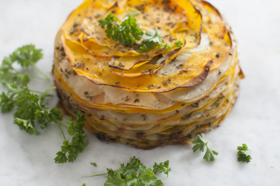 This March 31, 2014 photo shows roasted butternut and herb tart in Concord, N.H. (AP Photo/Matthew Mead)