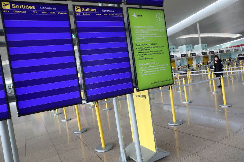 FILE PHOTO: Empty departures boards at Josep Tarradellas Barcelona-El Prat Airport