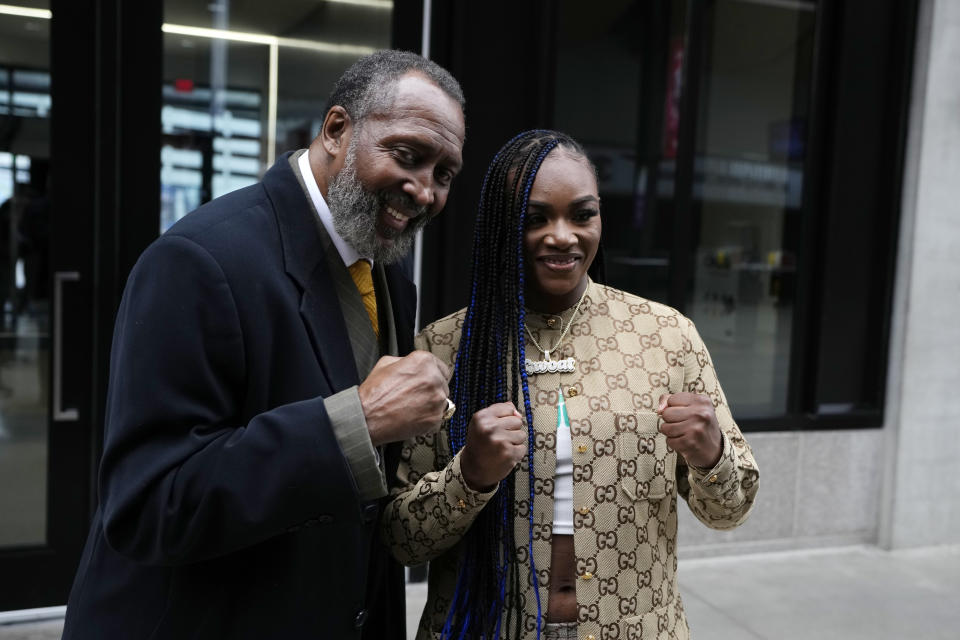 Two-time Olympic gold medalist and women's world middleweight champion Claressa Shields poses with Thomas "The Hitman" Hearns at Little Caesars Arena, Tuesday, April 18, 2023, in Detroit. Shields will fight Hanna Gabriels of Costa Rica on June 3. (AP Photo/Carlos Osorio)