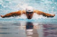 Michael Phelps swims in the men's 100 butterfly finals during day one of the 2012 Indianapolis Grand Prix at the Indiana University Natatorium, on March 29, in Indianapolis, Indiana. Phelps is counting the days to retirement, but the legendary swimmer, who owns 16 Olympic medals, insists he still has goals, plans and dreams