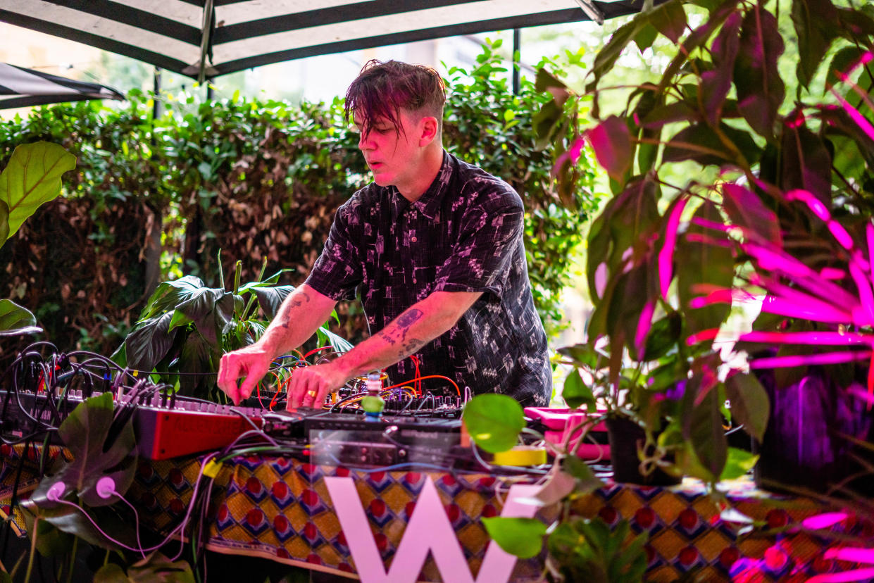 Ivan Lee hooks up plants to his mixer for a "Botanical Beats" benefit concert for the Trail Conservancy.