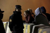 People stand outside Topo Chico Prison while waiting for news on their jailed family members in Monterrey, Mexico, February 11, 2016. REUTERS/Daniel Becerril