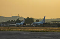 In this photo released by Russian Defense Ministry Press Service on Friday, June 25, 2021, a pair of the Russian air force's Tu-22M3 bombers taxi at the Hemeimeem air base in Syria. The Russian military on Friday launched sweeping maneuvers in the Mediterranean Sea featuring warplanes capable of carrying hypersonic missiles, a show of force amid a surge in tensions following an incident with a British destroyer in the Black Sea. (Russian Defense Ministry Press Service via AP)