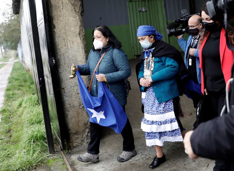 FILE PHOTO: Chileans vote for governors, mayors, councillors and constitutional assembly members to draft a new constitution, in Temuco