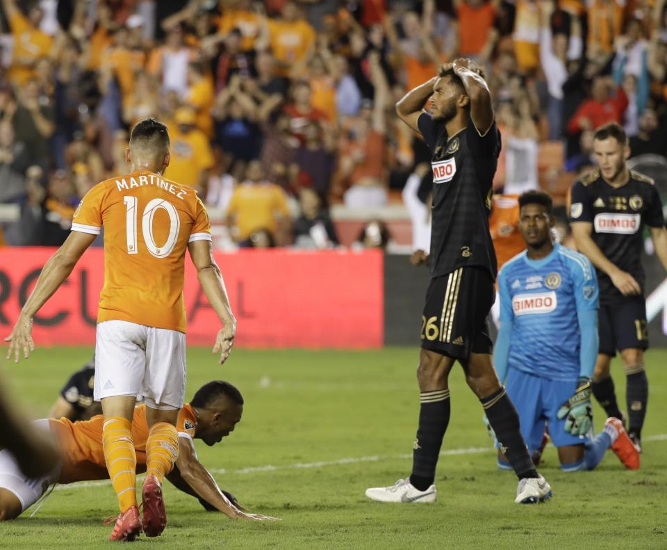 Philadelphia Union's Auston Trusty reacts after a goal during the second half of the U.S. Open Cup championship soccer match against the Houston Dynamo Wednesday, Sept. 26, 2018, in Houston. (AP Photo/David J. Phillip)