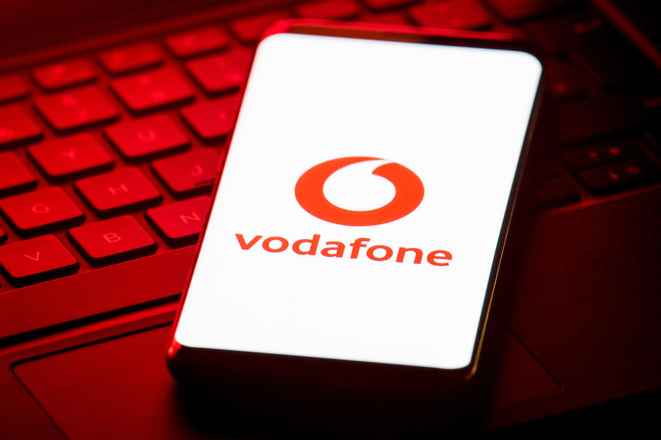 Vodafone logo displayed on the screen of a smartphone. Photo: Dominic Lipinski/PA Wire/PA Images