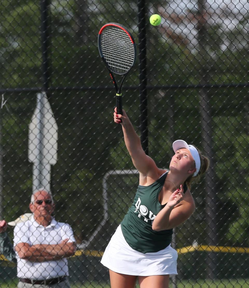 Dover's Joci Faasen returns a shot in her No. 2 singles match  during Friday's Division I girls tennis quarterfinal match against Pinkerton Academy.