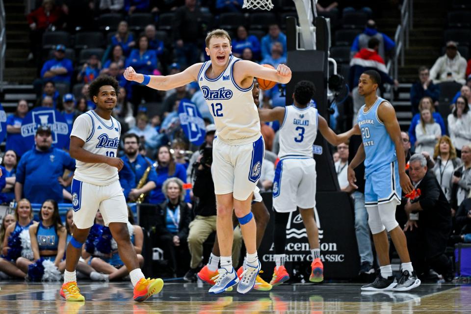 Drake Bulldogs guard Tucker DeVries (12) reacts after Drake defeated the Indiana State Sycamores to win the Missouri Valley Conference Tournament Championship at Enterprise Center.