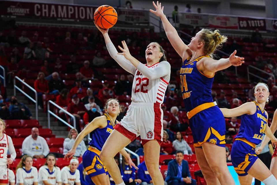 South Dakota women's basketball guard Chloe Lamb takes a layup against Western Illinois on Jan. 20, 2022.