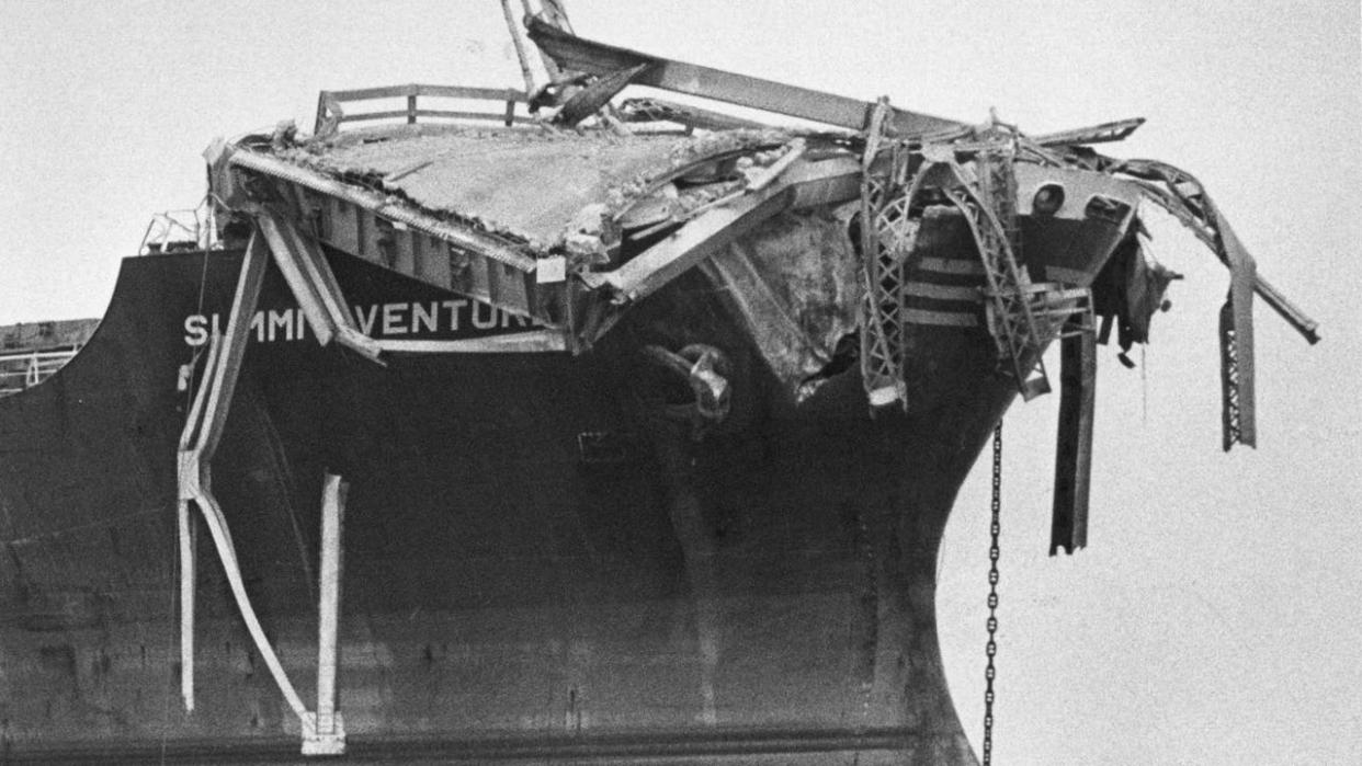 <div>9th May 1980: Debris from the Sunshine Skyway Bridge perched on the bow of the freighter Summit Venture after the vessel rammed the bridge during a thunderstorm at Tampa Bay, Florida, causing 34 deaths. (Photo by Keystone/Getty Images)</div>