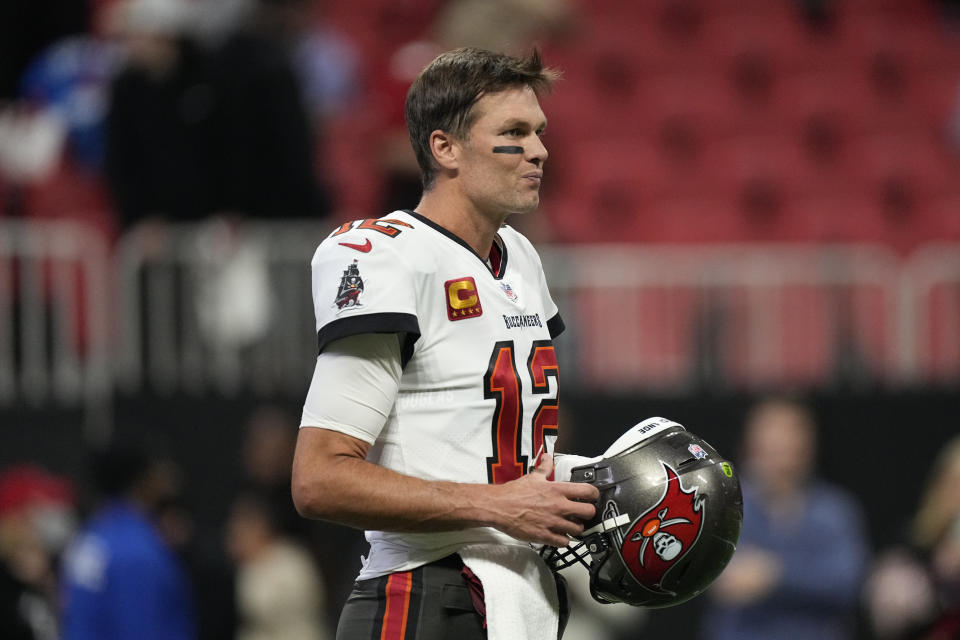 Tampa Bay Buccaneers quarterback Tom Brady (12) warms up before an NFL football game against the Atlanta Falcons, Sunday, Jan. 8, 2023, in Atlanta. (AP Photo/John Bazemore)