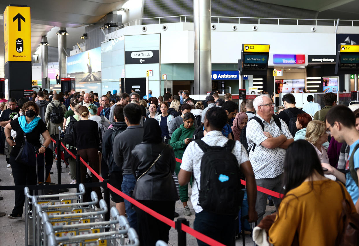 Queuing at Heathrow Airport: Which? has advised people to take care when buying travel insurance