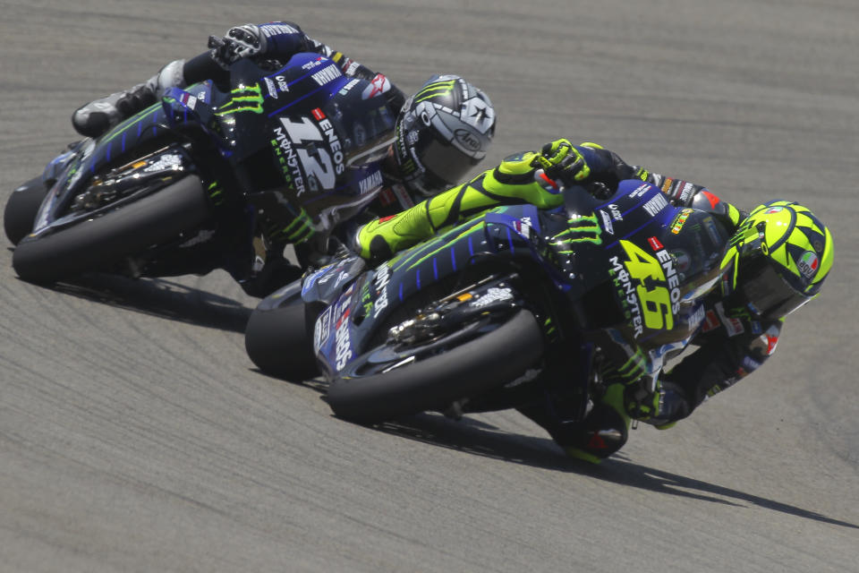 MotoGP Yamaha rider Valentino Rossi of Italy rides ahead of Yamaha rider Maverick Vinales of Spain during the Andalucia Motorcycle Grand Prix at the Angel Nieto racetrack in Jerez de la Frontera, Spain, Sunday July 26, 2020. Vinales finished 2nd with Rossi 3rd. (AP Photo/David Clares)