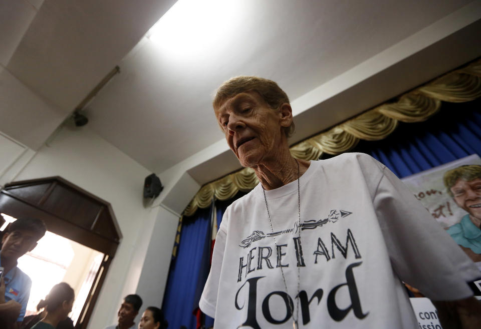 Australian Roman Catholic nun Sister Patricia Fox prepares for a news conference hours before her departure for Australia Saturday, Nov. 3, 2018, in Manila, Philippines. Sister Fox decided to leave after 27 years in the country after the Immigration Bureau denied her application for the extension of her visa. Sr. Fox called on Filipinos to unite and fight human rights abuses ahead of her forced departure from the country. (AP Photo/Bullit Marquez)