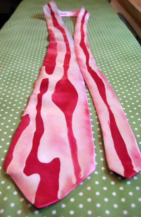 Perfect for the businessman/bacon aficionado.   <a href="http://www.etsy.com/listing/62901878/bacon-tie-hand-painted-silk-necktie?ref=sr_gallery_14&ga_search_query=bacon&ga_view_type=gallery&ga_ship_to=US&ga_page=20&ga_search_type=all">Etsy</a>, <strong>$40</strong>