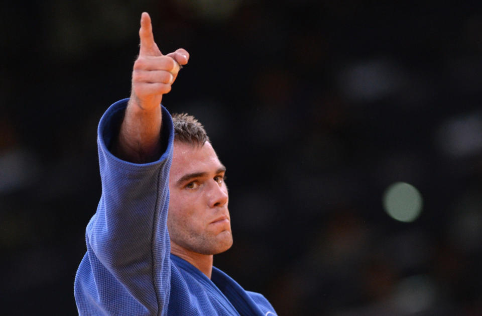 Canada's Antoine Valois-Fortier celebrates after winning against Azerbaijan's Elnur Mammadli during their men's -81kg judo contest match of the London 2012 Olympic Games on July 31, 2012 at the ExCel arena in London. AFP PHOTO / JOHANNES EISELEJOHANNES EISELE/AFP/GettyImages