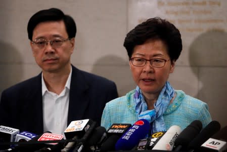 Hong Kong Chief Executive Carrie Lam and Secretary for Security John Lee Ka-chiu speak to media over an extradition bill in Hong Kong