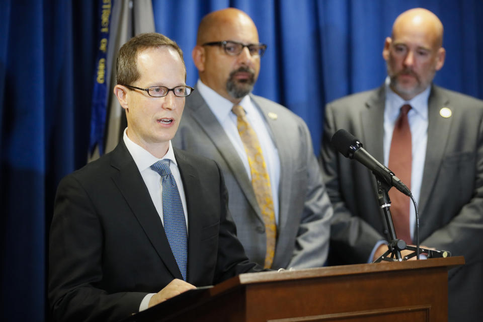 Benjamin Glassman, United States Attorney of the Southern District of Ohio, speaks during a news conference, Thursday, July 18, 2019, in Cincinnati. Federal authorities say Miami-Luken, an Ohio-based wholesale drug distributor that's been linked before to the opioid drug crisis, has been charged in a painkiller pill conspiracy cases. (AP Photo/John Minchillo)