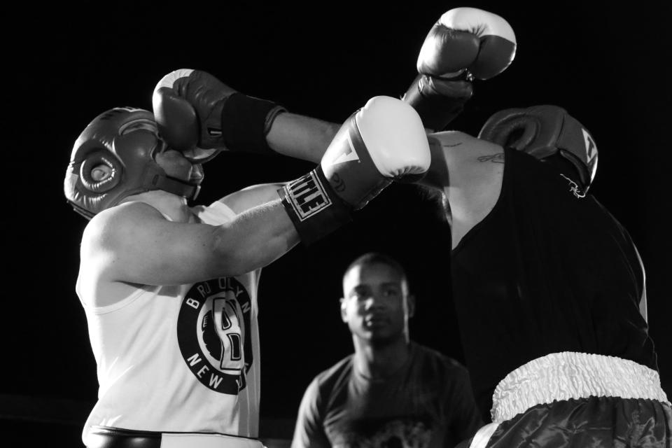 Arkadiusz Taraska, left, gets smashed in the face by Keith Stark during a grudge match at the Brooklyn Smoker in the parking lot of Gargiulo’s Italian Restaurant in Coney Island, Brooklyn, on Aug. 24, 2017. (Photo: Gordon Donovan/Yahoo News)