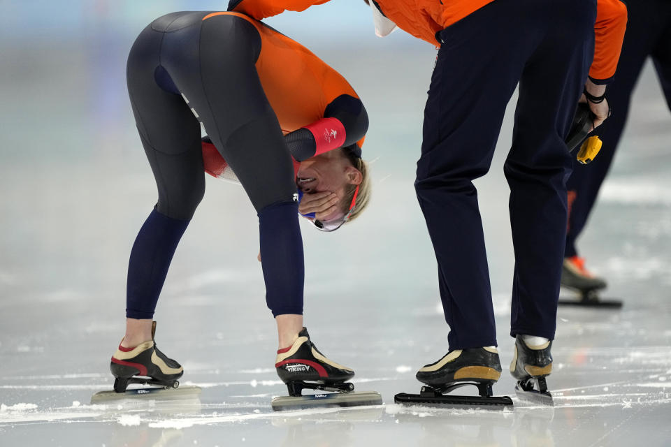 Irene Schouten of the Netherlands reacts after winning the gold medal and breaking the Olympic record in the women's speedskating 3,000-meter race at the 2022 Winter Olympics, Saturday, Feb. 5, 2022, in Beijing. (AP Photo/Ashley Landis)