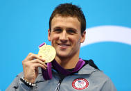<a href="http://sports.yahoo.com/olympics/swimming/ryan-lochte-1132448/" data-ylk="slk:Ryan Lochte;elm:context_link;itc:0;sec:content-canvas" class="link ">Ryan Lochte</a> of the United States celebrates with his Gold Medal during the Medal Ceremony for the Men's 400m Individual Medley on Day 1 of the London 2012 Olympic Games at the Aquatics Centre on July 28, 2012 in London, England. (Photo by Al Bello/Getty Images)