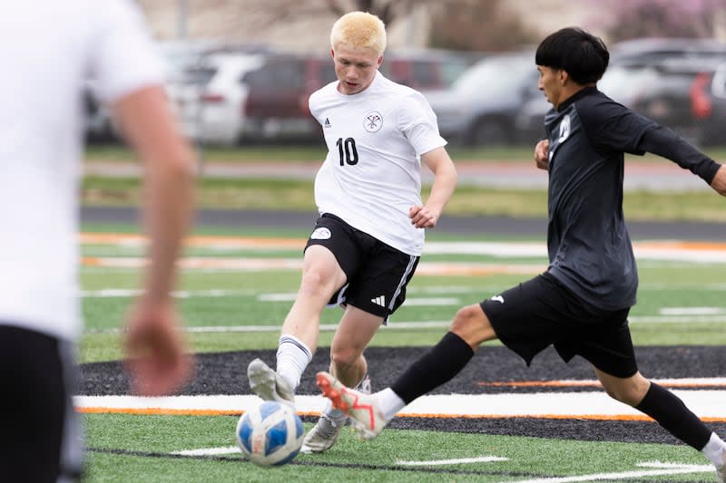 Park City Miners Quinn Kelly (10) and Murray Spartans Carlos Nieto-Rosales (7) fight for possession of the ball during a game at Murray High School in Murray on Friday, April 5, 2024.