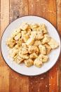 <p>Homemade potato gnocchi is surprisingly easy to make, and the dough is a dream to work with. Unlike <a href="https://www.delish.com/cooking/recipe-ideas/a32842783/pasta-dough-recipe/" rel="nofollow noopener" target="_blank" data-ylk="slk:homemade pasta;elm:context_link;itc:0;sec:content-canvas" class="link ">homemade pasta</a>, there's no resting or labored rolling involved. And with pre-mashed potatoes, you can skip straight to step 3 in this homemade pasta recipe! We tossed our gnocchi in plenty of Parmesan and butter for a simple <a href="https://www.delish.com/cooking/recipe-ideas/a24175464/cacio-e-pepe-recipe/" rel="nofollow noopener" target="_blank" data-ylk="slk:cacio e pepe;elm:context_link;itc:0;sec:content-canvas" class="link ">cacio e pepe</a> vibe, but we also have a <a href="https://www.delish.com/cooking/recipe-ideas/a22845363/tuscan-butter-gnocchi-recipe/" rel="nofollow noopener" target="_blank" data-ylk="slk:tuscan butter gnocchi;elm:context_link;itc:0;sec:content-canvas" class="link ">tuscan butter gnocchi</a> that we dream about regularly. <br><br>Get the <strong><a href="https://www.delish.com/cooking/recipe-ideas/a28576135/potato-gnocchi-recipe/" rel="nofollow noopener" target="_blank" data-ylk="slk:Cacio e Pepe Potato Gnocchi recipe;elm:context_link;itc:0;sec:content-canvas" class="link ">Cacio e Pepe Potato Gnocchi recipe</a></strong>.<br></p>