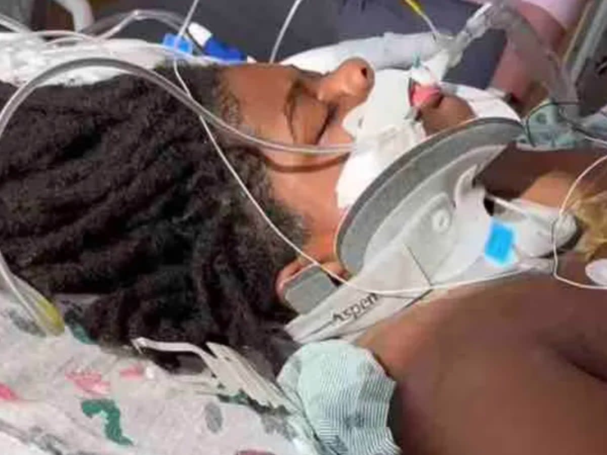 SJ Williams recovers at Children’s Health hospital in Dallas after he severed his spinal cord while running away from a wasp at a community swimming pool in Frisco, Texas.  (Camper/Williams family/ GoFundMe)