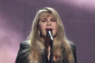 FILE - Inductee Stevie Nicks performs at the Rock & Roll Hall of Fame induction ceremony, March 29, 2019, in New York. In late 2020, Fleetwood Mac star Nicks sold an 80% stake in her music to Primary Wave for a reported $100 million. Her bandmates soon followed suit. (Photo by Evan Agostini/Invision/AP, File)