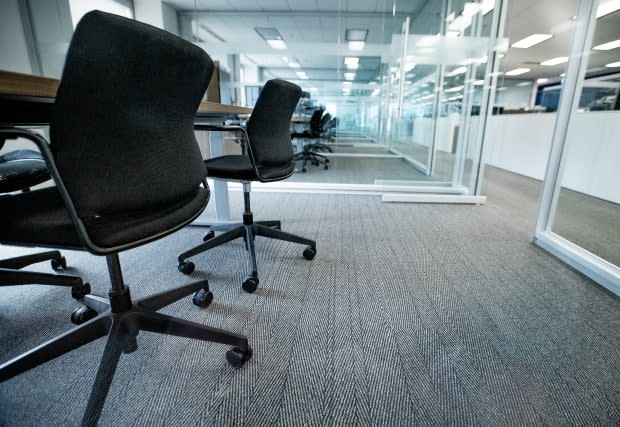 As companies make plans to gradually welcome workers back to their offices, some employees wonder if a hybrid arrangement is in their best interests. (Craig Chivers/CBC - image credit)