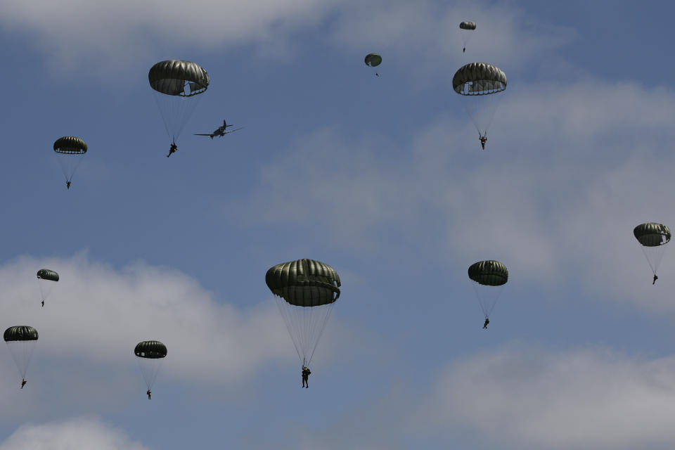 Parachute drop in Carentan-Les-Marais in Normandy, France on Sunday, June 02, 2024, ahead of D-Day 80th anniversary commemorations. (AP Photo/Jeremias Gonzalez)