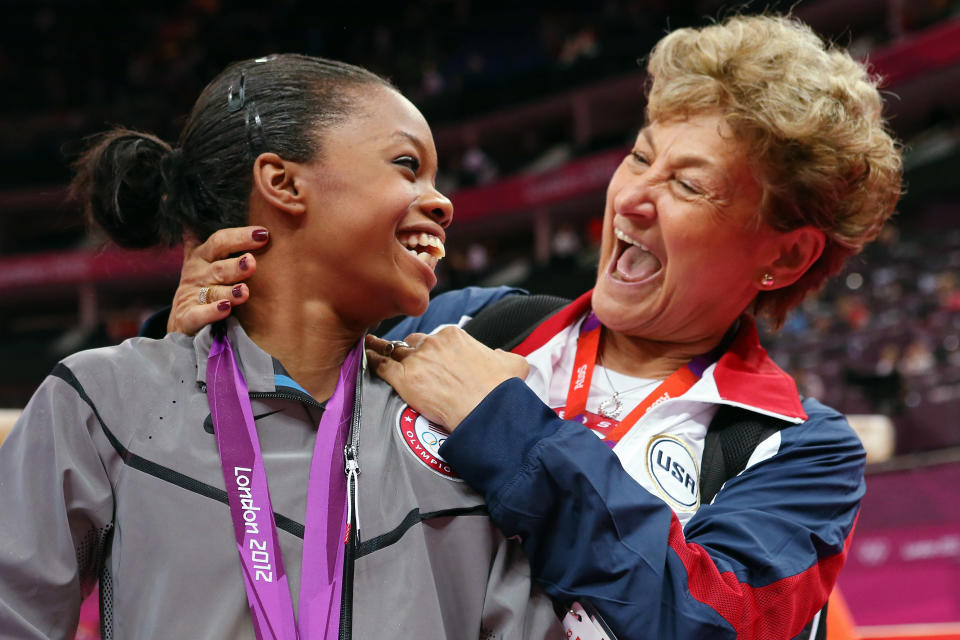 Gabrielle Douglas of the United States celebrates winning the gold medal with team coordinator Martha Karolyi after the Artistic Gymnastics Women's Individual All-Around final on Day 6 of the London 2012 Olympic Games at North Greenwich Arena on August 2, 2012 in London, England. (Photo by Ronald Martinez/Getty Images)