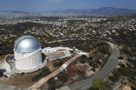 The area around National Observatory on Penteli mountain, which had been burned in a mid-August wildfire, is seen in northern Athens, Thursday, Aug. 22, 2024. (AP Photo/Thanassis Stavrakis)