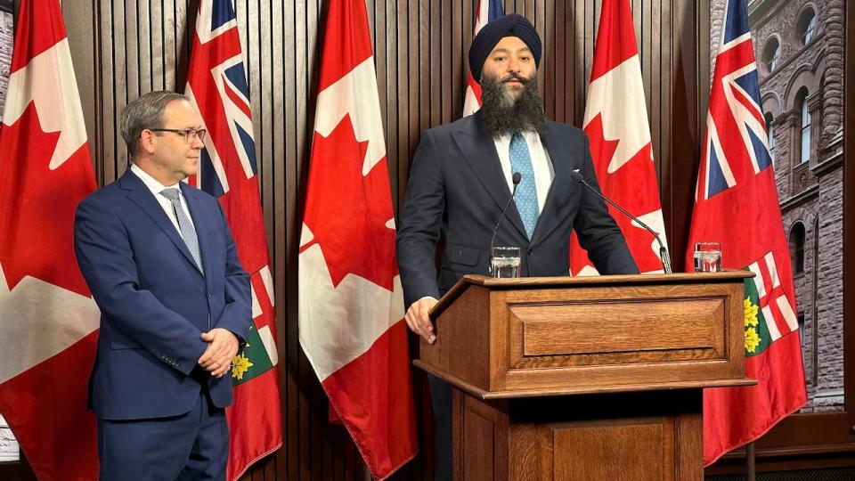 Ontario's Minister of Transportation Prabmeet Sarkaria, right, during a news conference with Attorney General Doug Downey at Queen's Park.  