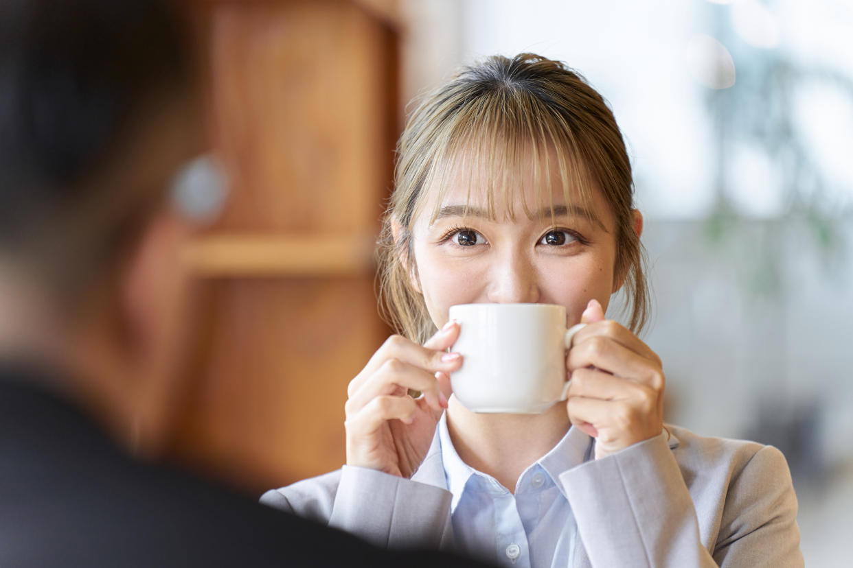 Woman having fun on a date at a cafe