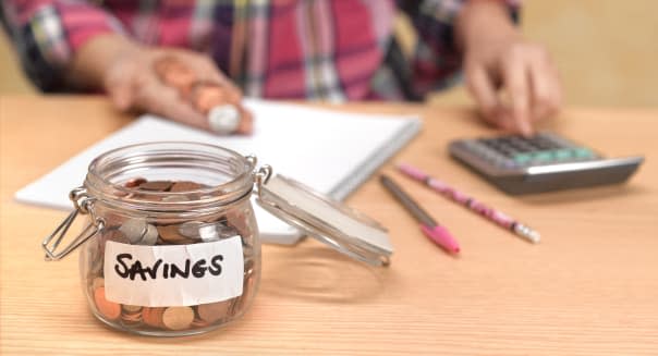 Teenager counting savings