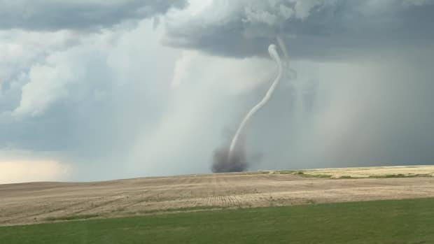 A tornado was spotted near D'arcy, Sask. (Kent Llewit/Twitter - image credit)