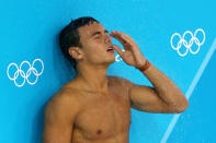 <b>Tom Daley taunted:</b> Police arrested a 17-year-old man on suspicion of malicious communication after British diver Tom Daley received tweets saying he had let down his deceased father by finishing fourth and failing to win a medal.<br><br> <a href="http://in.news.yahoo.com/cyberbullies-targeting-athletes-told-back-off-005420734--spt.html " data-ylk="slk:Cyberbullies told to back off;elm:context_link;itc:0;sec:content-canvas;outcm:mb_qualified_link;_E:mb_qualified_link;ct:story;" class="link  yahoo-link">Cyberbullies told to back off</a>