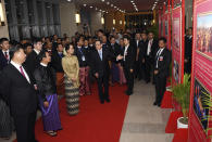 In this Jan. 17, 2020, photo provided by Myanmar News Agency (MNA), Chinese President Xi Jinping, left, Myanmar President Win Myint, second from left, and Myanmar leader Aung San Suu Kyi, third from left, attend a ceremony to mark the Myanmar-China 70th Anniversary of Establishment of Diplomatic Relations in Naypyitaw, Myanmar.(Myanmar News Agency via AP)