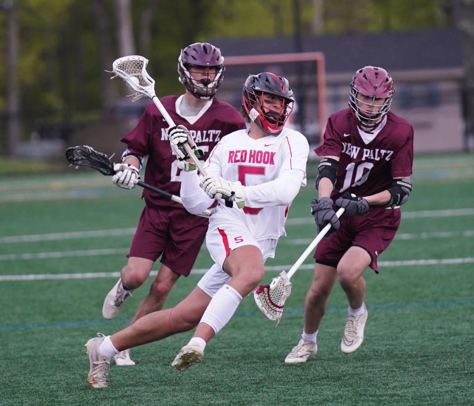 Red Hook's Gabe Gravino (5) puts a shot on goal during their 17-5 win over New Paltz in boys lacrosse action at Bard College in Annandale-on-Hudson on Wednesday, May 3, 2023. 