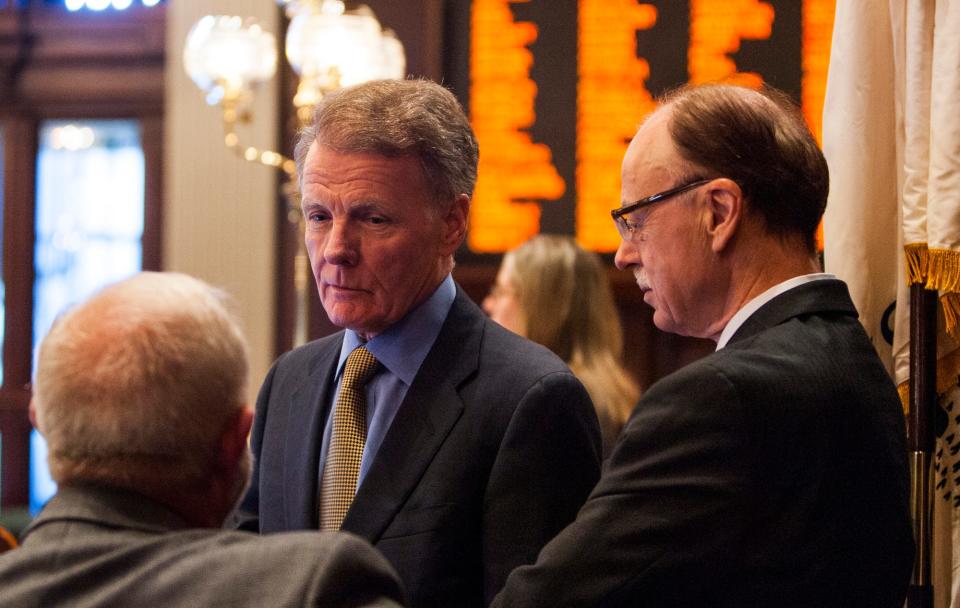 Illinois Speaker of the House Michael Madigan, D-Chicago, stands with Chief of Staff Tim Mapes, right, in 2012 at the state Capitol in Springfield.