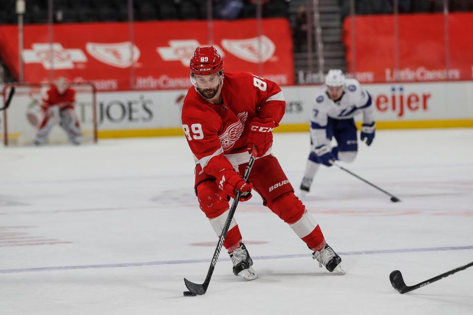 Detroit Red Wings center Sam Gagner (89) makes a pass against the Tampa Bay Lightning during the third period at Little Caesars Arena in Detroit, on Tuesday, March 9, 2021.