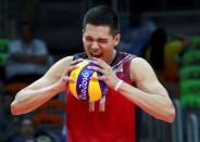 2016 Rio Olympics - Volleyball - Final - Men's Bronze Medal Match USA v Russia - Maracanazinho - Rio de Janeiro, Brazil - 21/08/2016. Micah Christenson (USA) of USA reacts. REUTERS/Yves Herman