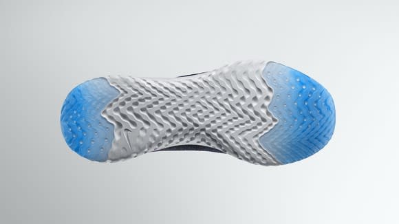 The bottom side of a Nike running shoe.