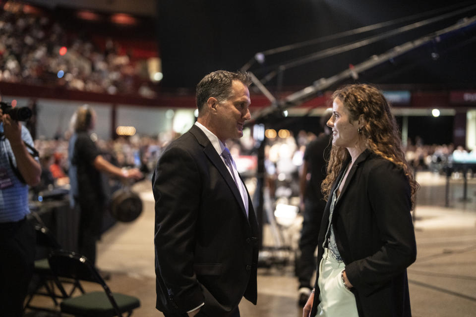 Minnesota head coach Ken Klee, left, talks with second-round draft pick Britta Curl, right, after Curl was drafted during the PWHL hockey draft in St. Paul, Minn., Monday June, 10, 2024. (Renée Jones Schneider/Star Tribune via AP)