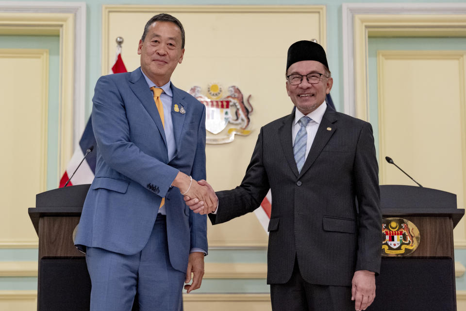 Thai Prime Minister, Srettha Thavisin, shakes hands with Malaysia's Prime Minister Anwar Ibrahim on the occasion of Thavisin's official visit to Malaysia, in Jakarta, Wednesday, Oct. 11, 2023. (Afiq Hambali/Prime Minister’s Office of Malaysia via AP)