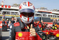 Ferrari driver Charles Leclerc of Monaco celebrates after he clocked the fastest time during the qualifying session for the French Formula One Grand Prix at Paul Ricard racetrack in Le Castellet, southern France, Saturday, July 23, 2022. The French Grand Prix will be held on Sunday. (Eric Gaillard, Pool via AP)